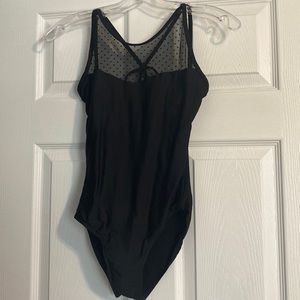 Wear Moi adult small back leotard with sheer front and cross croissant back.